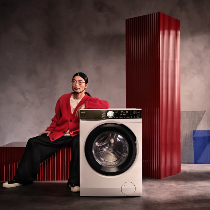 Man next to washing machines
